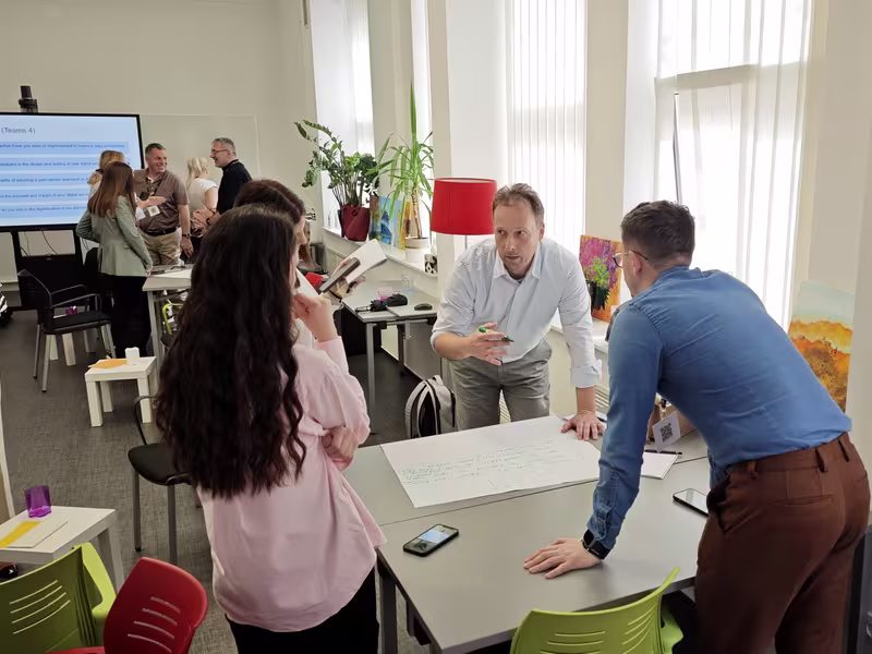 Tired team in a retrospective meeting